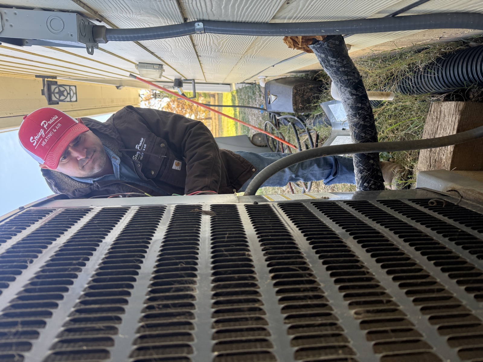 Ron performing AC repair