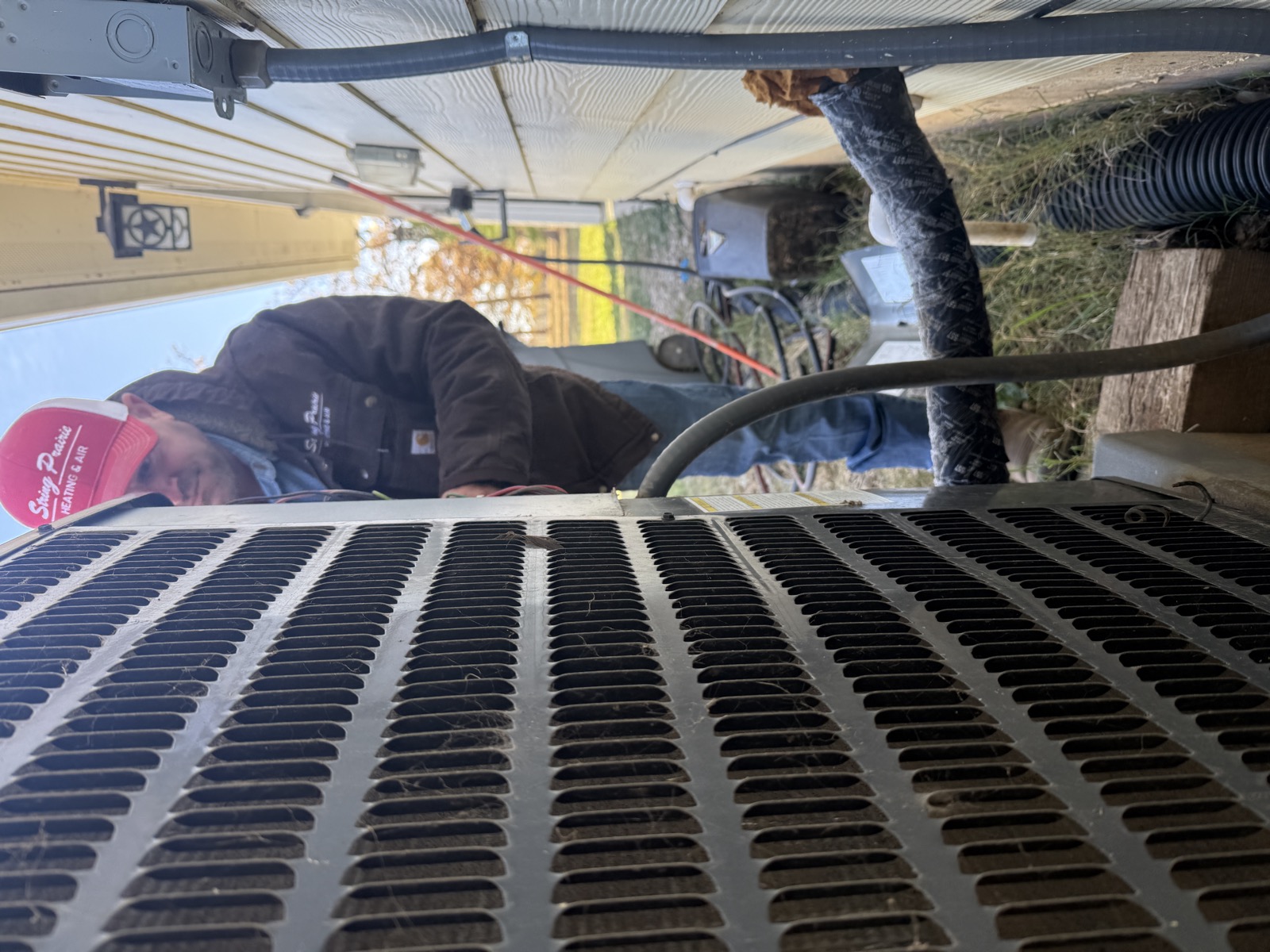 Ron from String Prairie working on AC unit